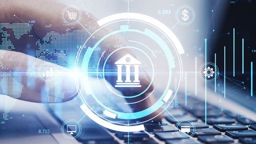 Close up of hands using laptop keyboard on desktop with creative online banking hologram on blurry background. Technology, fintech and finance concept. Double exposure.