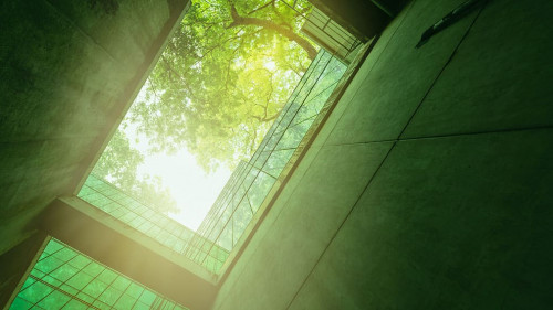 Eco-friendly building in the modern city. Sustainable glass offi