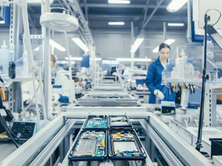 Shot of an Electronics Factory Workers Assembling Circuit Boards