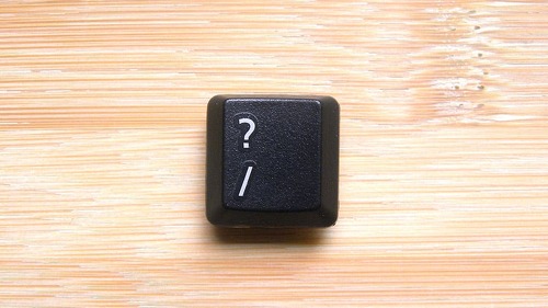 Black color Question mark key of computer keyboard