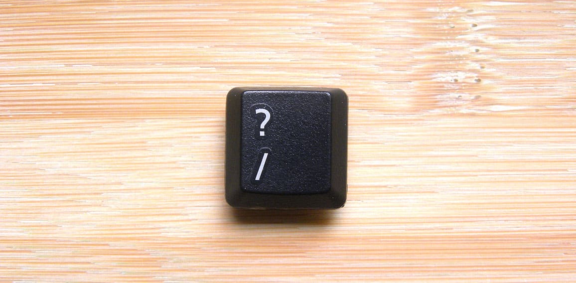Black color Question mark key of computer keyboard