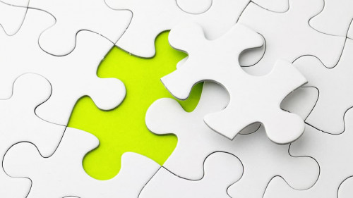 Puzzle with missing piece in green color