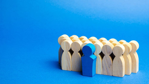 A team of workers on a blue background. The concept of personnel selection and management within the team. Dismissal and hiring people to work. Human Resource Management. Headhunting. Talented worker