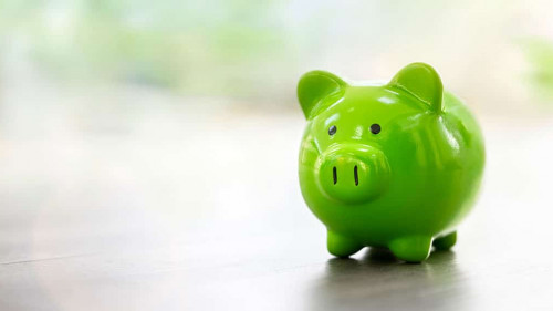 Green piggy bank saving, accounting, banking and business accoun
