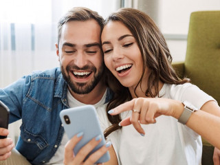 Beautiful young couple in love at home