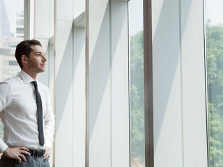 Portrait of Businessman at Window 4