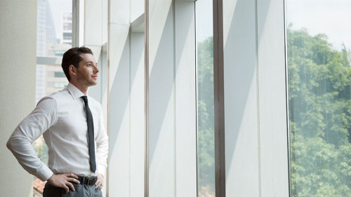 Portrait of Businessman at Window 4