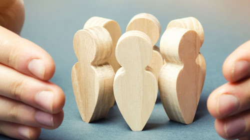 Boss defending his team with a gesture of protection. Life insurance. Customer care, care for employees. Security and safety in a business team. Human resources. A responsibility. Social protection