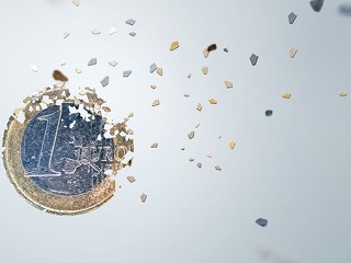 1 Euro coin breaking into pieces