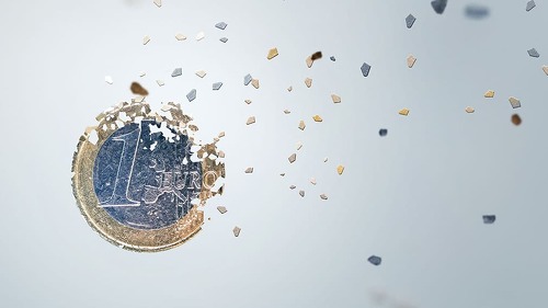 1 Euro coin breaking into pieces