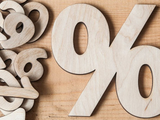 sign percent on wooden table