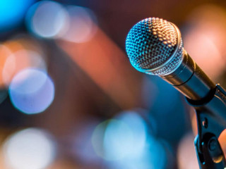Close-up of classic microphone at concert