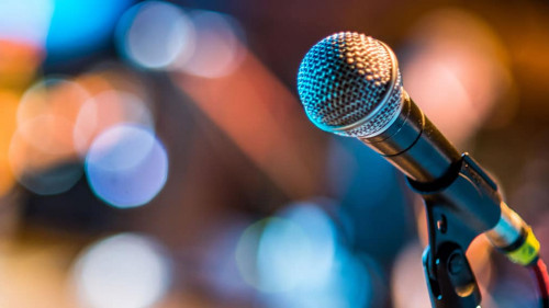 Close-up of classic microphone at concert