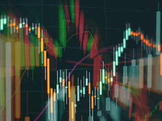 Technical price graph and indicator, red and green candlestick chart on blue theme screen, market volatility, up and down trend. Stock trading, crypto currency background.