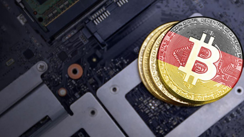 golden bitcoins with flag of germany on a computer electronic circuit board. bitcoin mining concept.