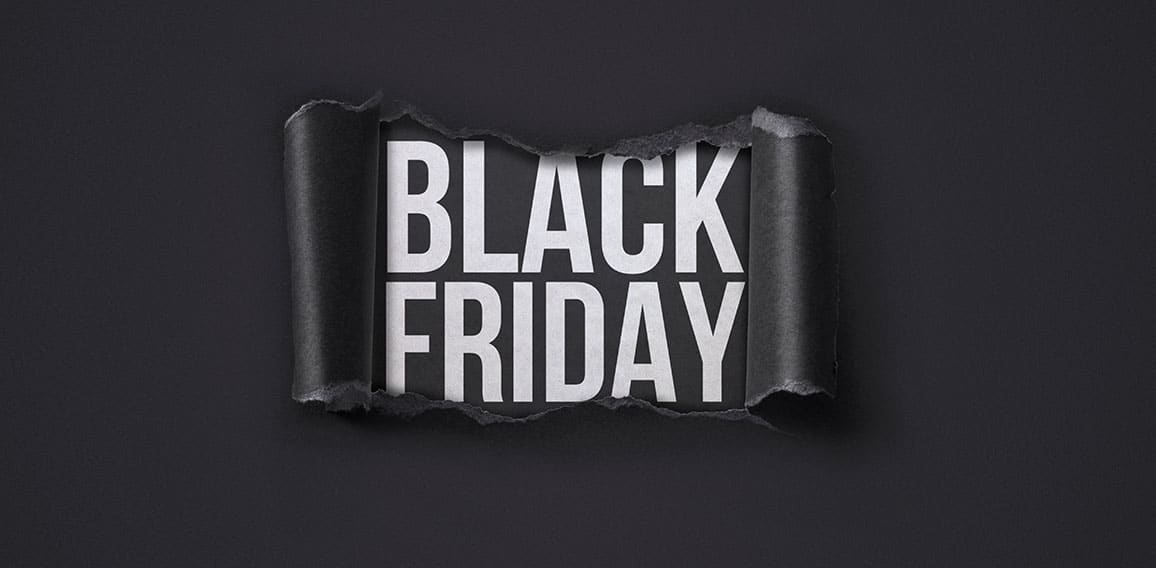 Black Friday promotional banner with torn paper hole