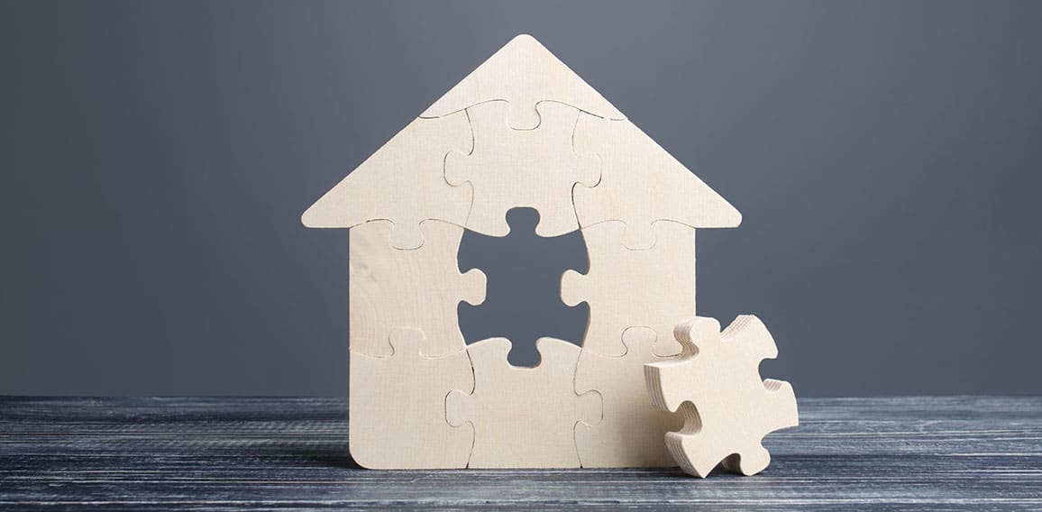 Puzzle house with a missing piece. The acquisition or construction comfortable dream home. Mortgage loan purchase real estate. Arrangement premises repair. Availability and cheapness. Finish building