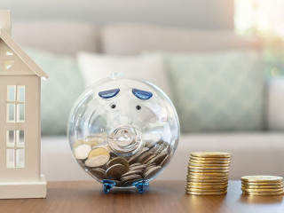 Haus-Sparschwein-Muenzen-405783513-AS-Chinnapong