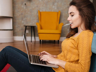 Portrait of a young woman doing shopping online