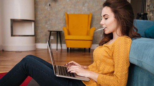 Portrait of a young woman doing shopping online