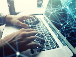 Businessman works in office with a laptop with internet effects. Concept of internet sharing and company startup