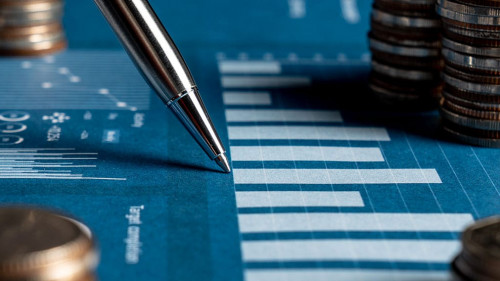 Pile of gold coins stack in finance treasury deposit bank account for saving