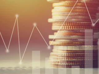 Stacked of coin money with account book finance and banking conc