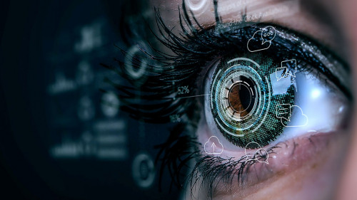 Close up of woman eye in process of scanning