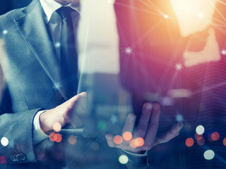 Businessmen that works with his laptop. Concept startup company. double exposure