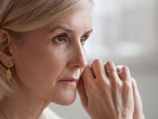 Thoughtful serious anxious mature senior woman feeling worried a