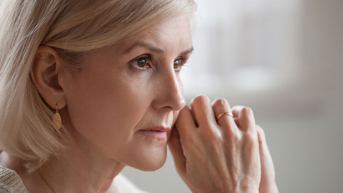 Thoughtful serious anxious mature senior woman feeling worried a
