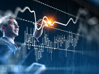 Business graph and trade monitor . Mixed media