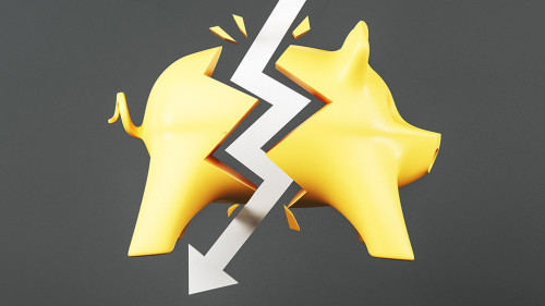 Crisis concept with white arrow hitting yellow piggy bank at dark background.