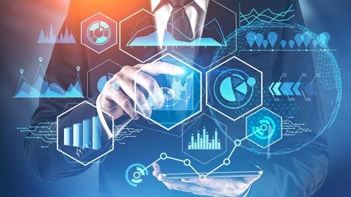 Man working with tablet and digital graphs