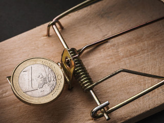 One euro in a mousetrap. Financial trap concept
