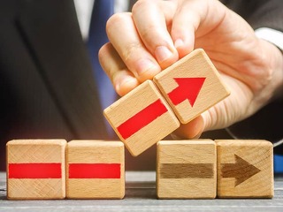 Businessman is building an alternative path. Revision of the strategy and process changes. Improvement, modernization. Flexibility and business adaptation to new conditions. Rethinking old approaches.