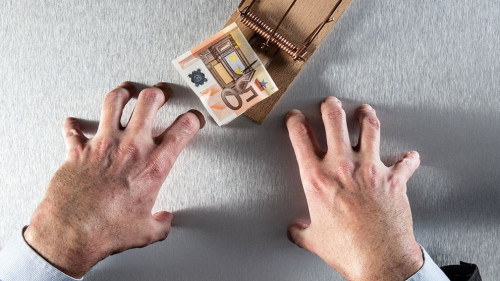 impatient businessman waiting to grab euro for corporate theft