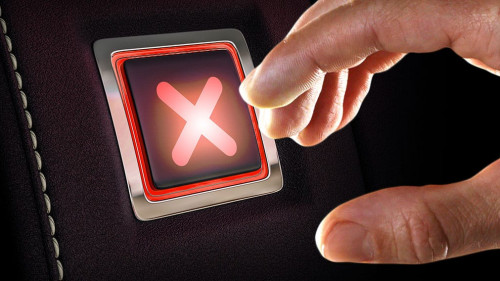 Finger about to press cross button. Mixed media