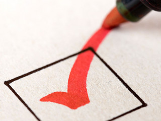 Macro photography of check mark on white background