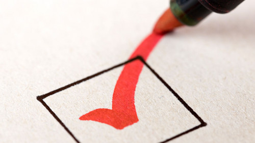 Macro photography of check mark on white background