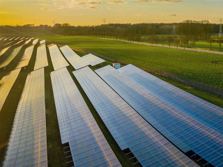 Photovoltaic panels on open spaces. The solar park along highway