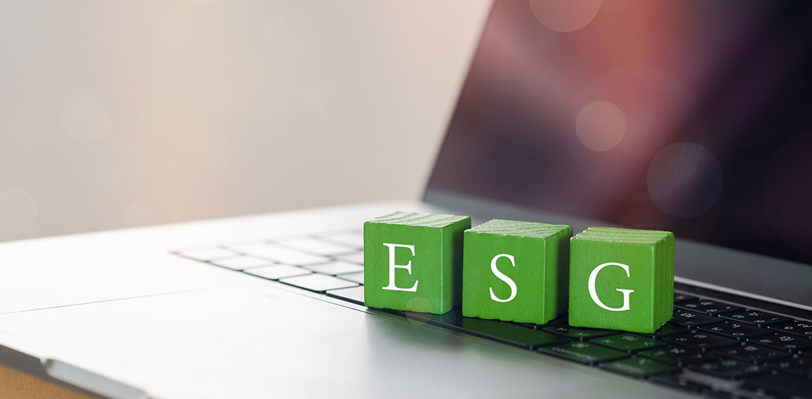Wooden cubes with target setting to ESG icon with other ESG icon