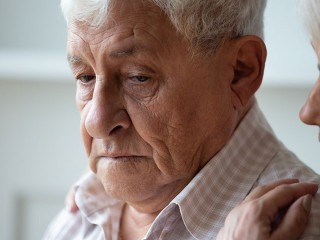 Caring old wife support caress sad senior husband