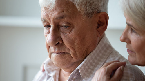 Caring old wife support caress sad senior husband
