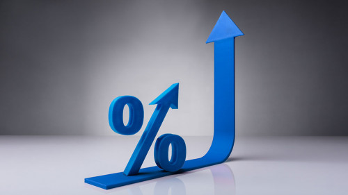 Close-up Of Percentage Symbol On Red Arrow