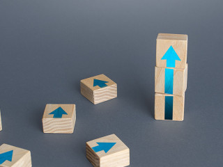 Block tower of arrows and extra blocks. Growth, development progress concept. Achieve success. Career promotion. Step by step. improving skills. Progress and movement forward. Goal achievement.