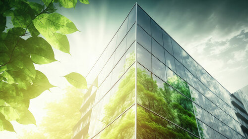 eco friendly construction in a contemporary metropolis. A sustainable glass building with green tree branches and leaves for lowering heat and carbon dioxide. Green workplace office building. Green li. Generative AI