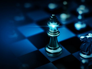 Chess board game to represent the business strategy with competition and challenging concept