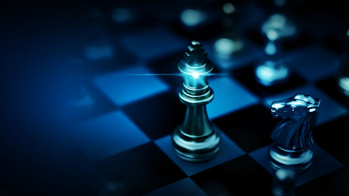 Chess board game to represent the business strategy with competition and challenging concept