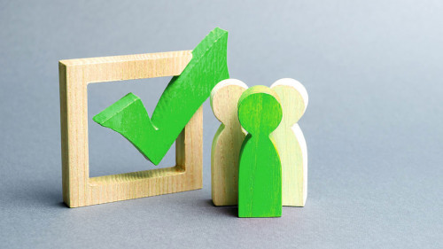 people stand near the checkbox for voting in elections. Lobbying interests, election corruption, voter bribery, rigging election results. Presidency elections. banner, place for text. Selective focus